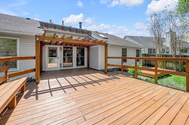 deck with fence and a pergola