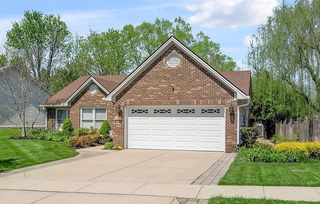 single story home featuring driveway, an attached garage, fence, brick siding, and a front lawn