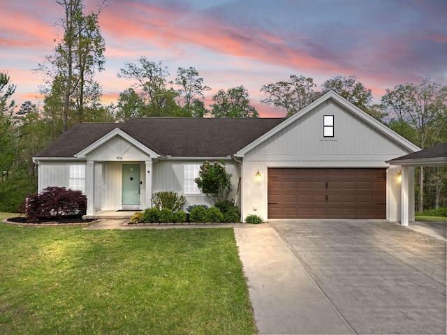 416 Scarlet Oak Dr, London, KY 40741 - view of front of home featuring driveway, a garage, and a front lawn
