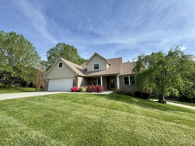 traditional home with concrete driveway, roof with shingles, a front yard, an attached garage, and brick siding