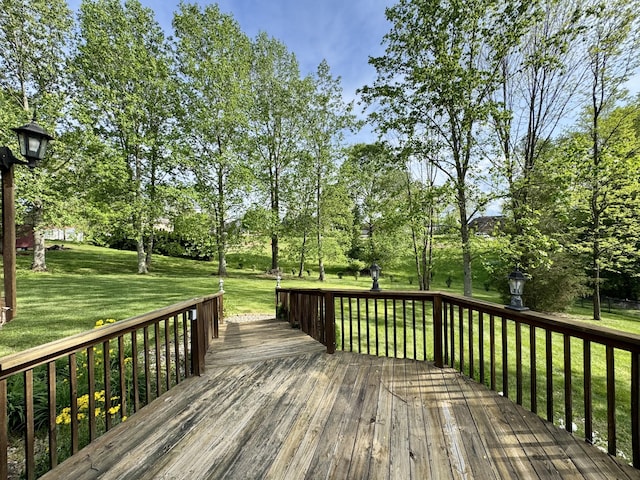 wooden deck with a yard