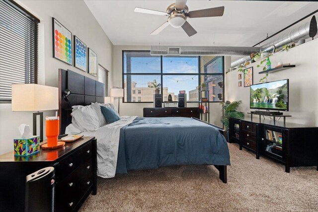 121 N Martin Luther King Blvd Unit 401, Lexington, KY 40508 - bedroom featuring ceiling fan and carpet floors