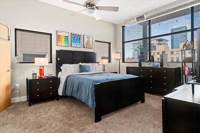 121 N Martin Luther King Blvd Unit 401, Lexington, KY 40508 - bedroom featuring visible vents, ceiling fan, carpet flooring, and baseboards