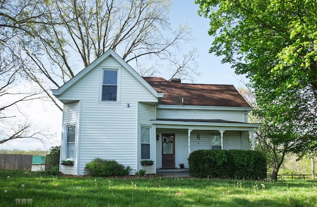 1770 Millersburg-Cynthiana Rd, Paris, KY 40361 - view of front of home with covered porch, fence, and a front yard