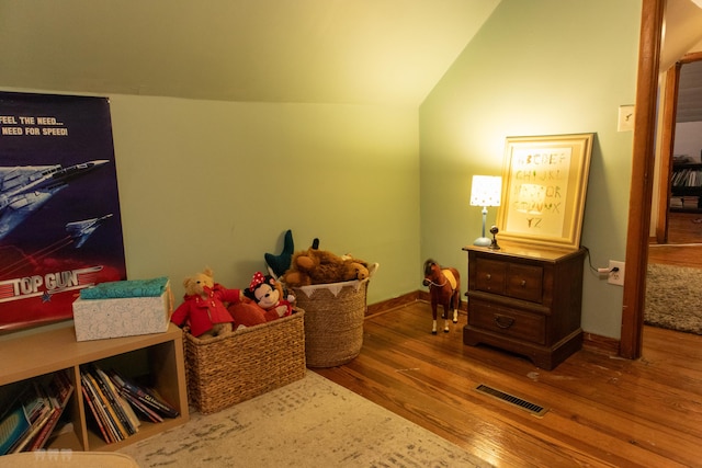 1770 Millersburg-Cynthiana Rd, Paris, KY 40361 - playroom featuring visible vents, vaulted ceiling, wood finished floors, and baseboards