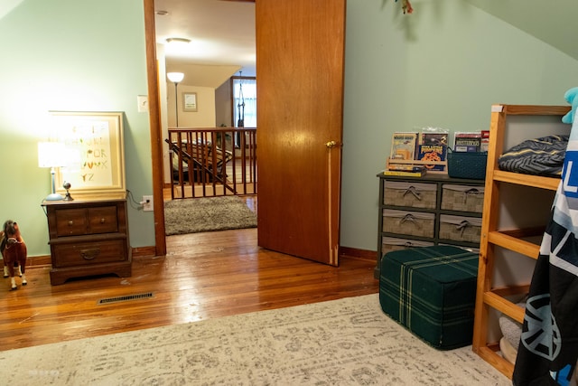 1770 Millersburg-Cynthiana Rd, Paris, KY 40361 - interior space featuring baseboards, visible vents, wood finished floors, and vaulted ceiling