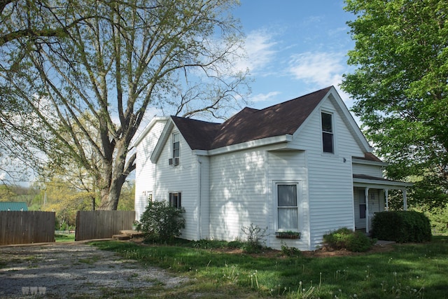 1770 Millersburg-Cynthiana Rd, Paris, KY 40361 - view of home's exterior with fence and roof with shingles