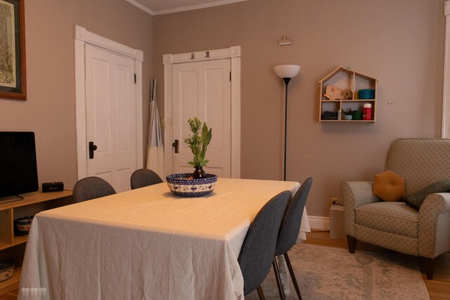 1770 Millersburg-Cynthiana Rd, Paris, KY 40361 - dining space with baseboards, wood finished floors, and crown molding