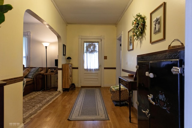 1770 Millersburg-Cynthiana Rd, Paris, KY 40361 - doorway to outside featuring arched walkways, wood finished floors, and ornamental molding