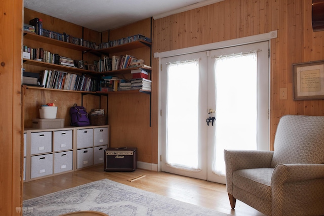 1770 Millersburg-Cynthiana Rd, Paris, KY 40361 - living area with wood walls, wood finished floors, and french doors