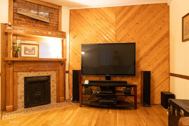 1770 Millersburg-Cynthiana Rd, Paris, KY 40361 - living area with a tiled fireplace, wood finished floors, and wooden walls