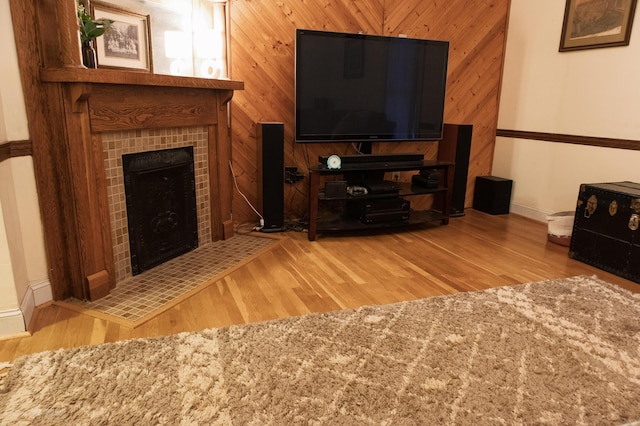 1770 Millersburg-Cynthiana Rd, Paris, KY 40361 - living area featuring baseboards, wood finished floors, wooden walls, and a fireplace