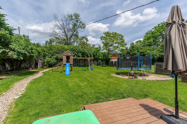 1139 Venetian Way, Lexington, KY 40517 - view of yard featuring a trampoline, a playground, and a wooden deck