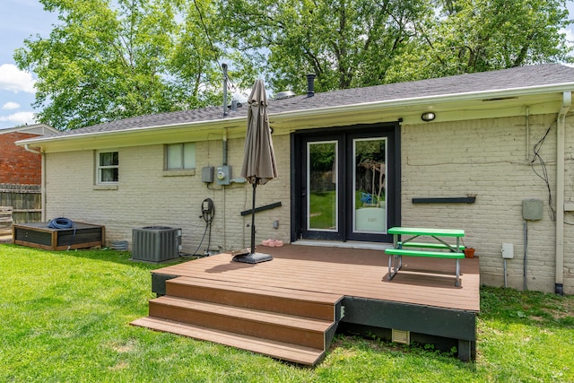 1139 Venetian Way, Lexington, KY 40517 - rear view of property featuring a lawn, a wooden deck, brick siding, and central AC unit