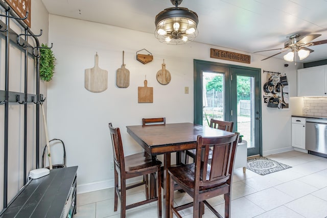 1139 Venetian Way, Lexington, KY 40517 - dining space featuring light tile patterned floors, a ceiling fan, baseboards, and a chandelier