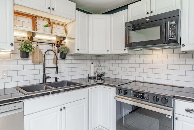 1139 Venetian Way, Lexington, KY 40517 - kitchen featuring black microwave, electric range, dishwasher, a sink, and white cabinetry