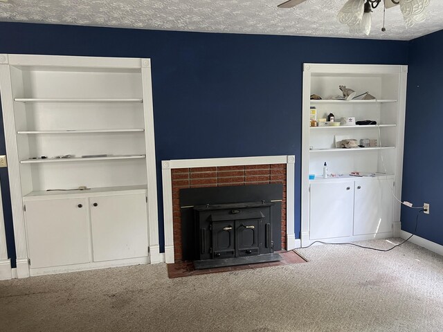 513 Sharp Gap Rd, Barbourville, KY 40906 - unfurnished living room featuring baseboards, ceiling fan, a textured ceiling, and carpet flooring