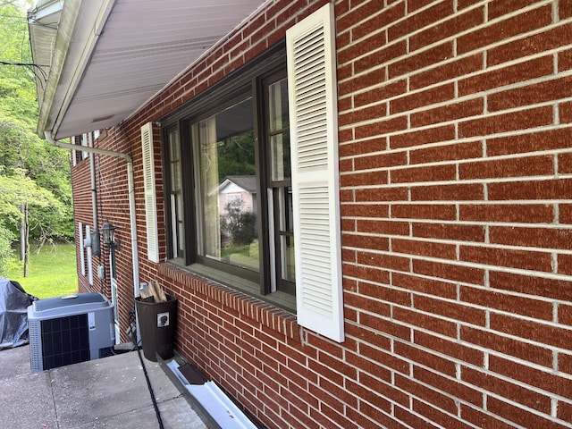 513 Sharp Gap Rd, Barbourville, KY 40906 - view of side of home with central AC and brick siding