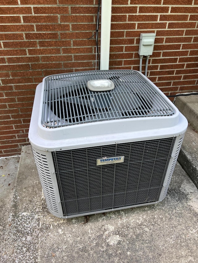 513 Sharp Gap Rd, Barbourville, KY 40906 - exterior details with central AC unit and brick siding