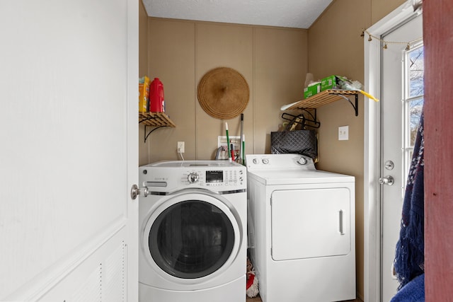 12739 Stulltown Rd, Hope, KY 40334 - clothes washing area featuring separate washer and dryer and laundry area