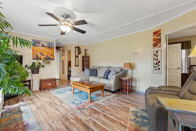 12739 Stulltown Rd, Hope, KY 40334 - living area with crown molding, ceiling fan, and wood finished floors