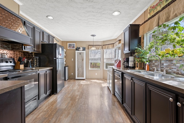 12739 Stulltown Rd, Hope, KY 40334 - kitchen with premium range hood, a sink, backsplash, and range with electric cooktop