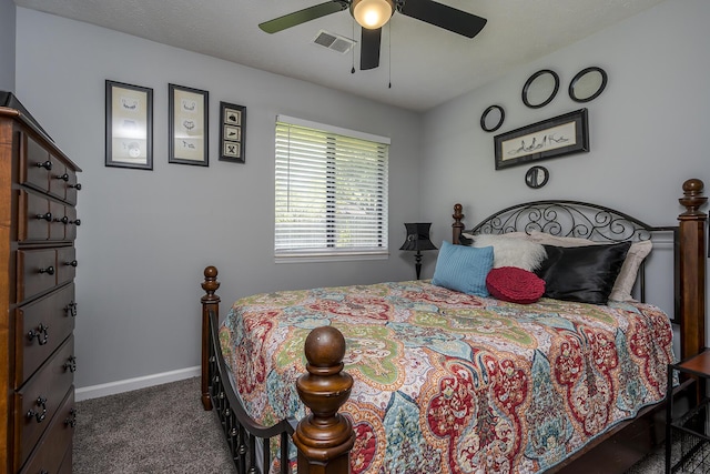 bedroom with baseboards, visible vents, a ceiling fan, and carpet floors