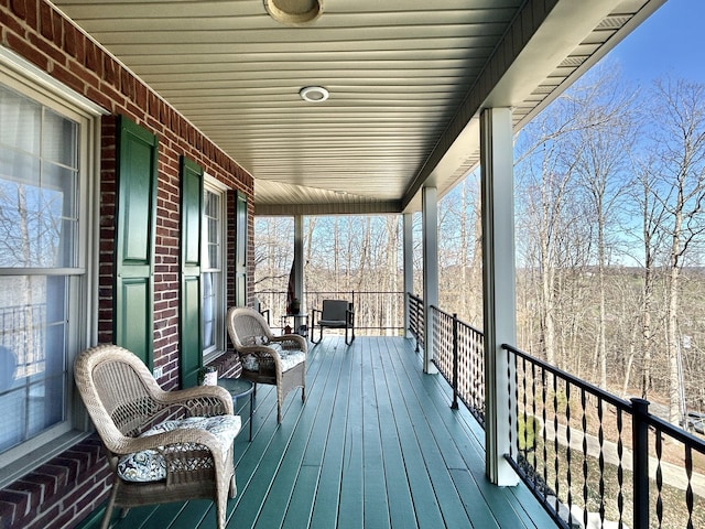 wooden terrace with covered porch