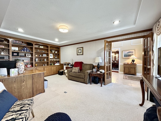 living room with recessed lighting, light carpet, a textured ceiling, and french doors