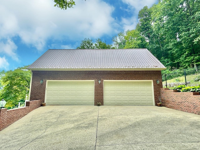 detached garage with fence