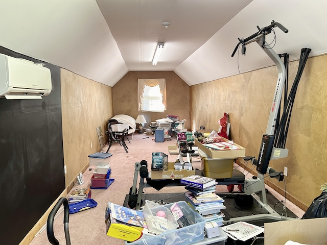 bonus room with a wall mounted air conditioner, carpet flooring, and vaulted ceiling
