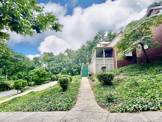 view of property exterior featuring brick siding