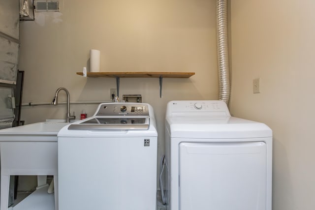 420 Stonehedge Pl, Lexington, KY 40517 - laundry room with laundry area, washer and clothes dryer, and a sink