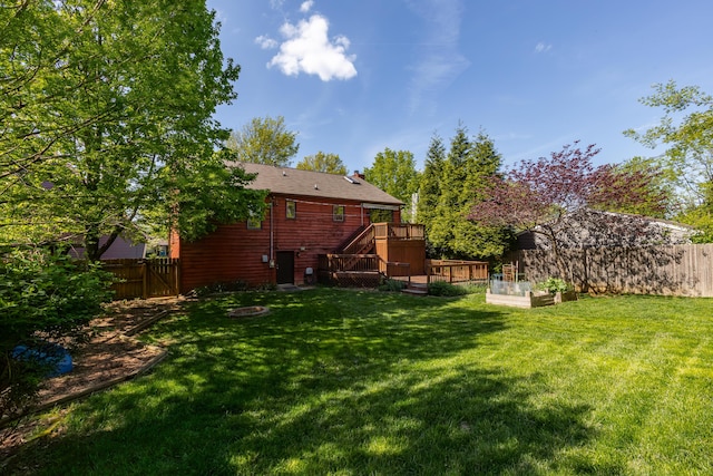 420 Stonehedge Pl, Lexington, KY 40517 - view of yard featuring a fenced backyard, a wooden deck, a vegetable garden, and stairway