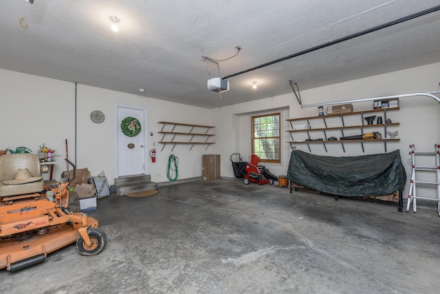 garage featuring a garage door opener