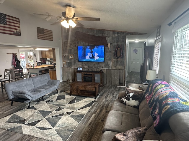 91 Barnett Rd, Brodhead, KY 40409 - living area with an accent wall, wood finished floors, ceiling fan, and a textured ceiling
