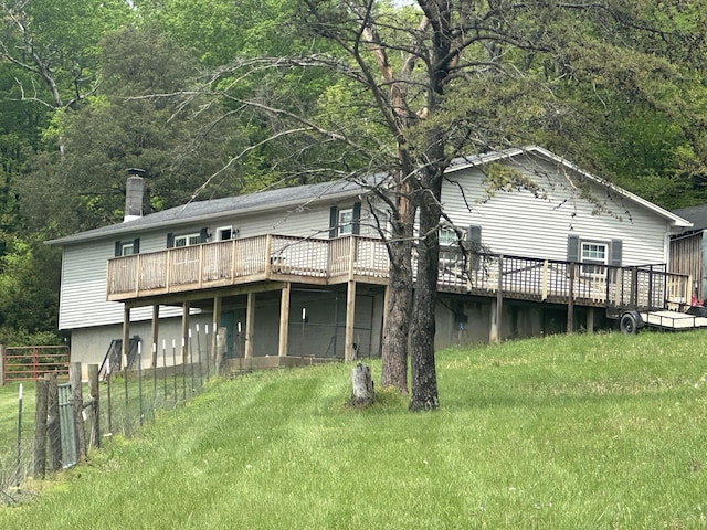 91 Barnett Rd, Brodhead, KY 40409 - view of yard featuring a deck, a barn, a view of trees, and an outbuilding