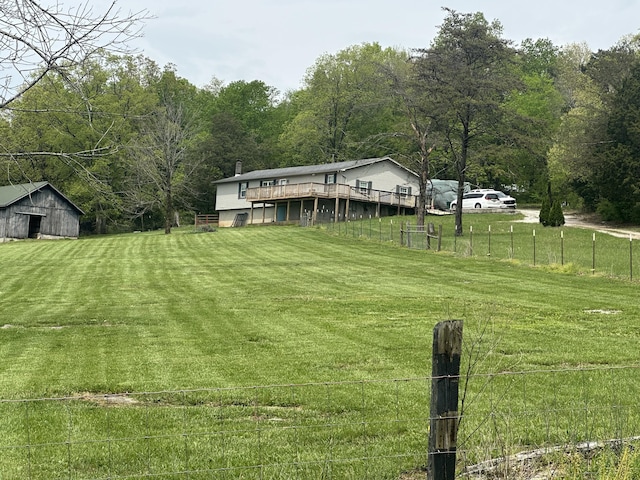 91 Barnett Rd, Brodhead, KY 40409 - view of yard featuring a deck, a forest view, and fence