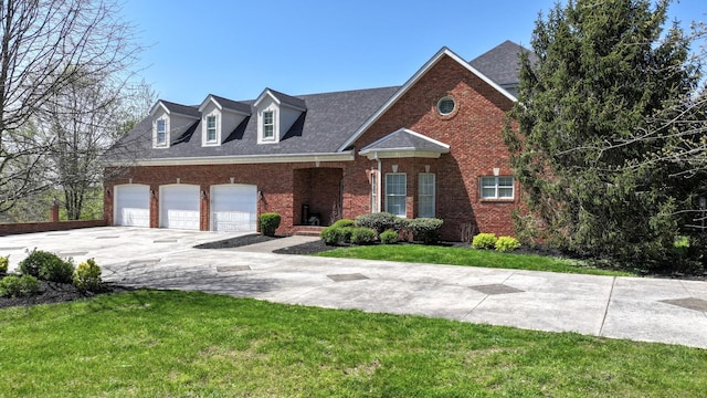 view of front of property with driveway, roof with shingles, a front yard, and brick siding