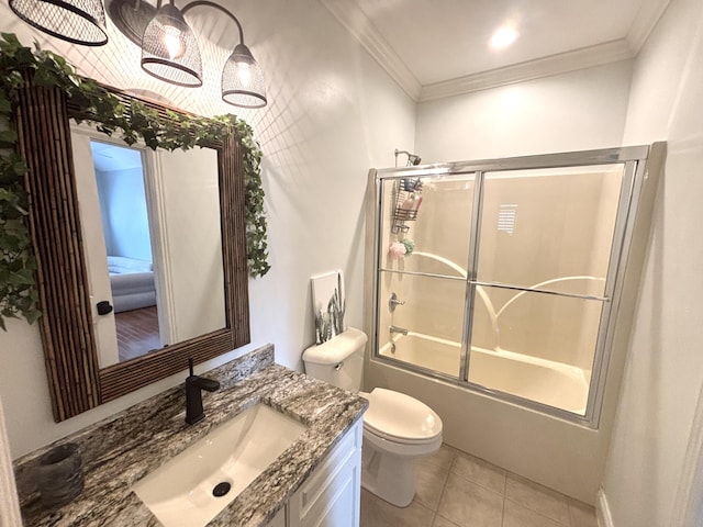 full bath with tile patterned floors, enclosed tub / shower combo, ornamental molding, toilet, and vanity