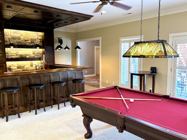 recreation room featuring plenty of natural light, billiards, and a dry bar