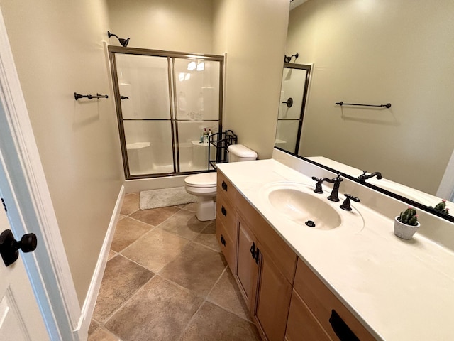 full bath featuring an enclosed shower, toilet, vanity, and baseboards