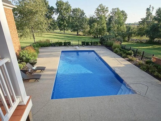 view of pool with a fenced backyard, a patio area, and a fenced in pool