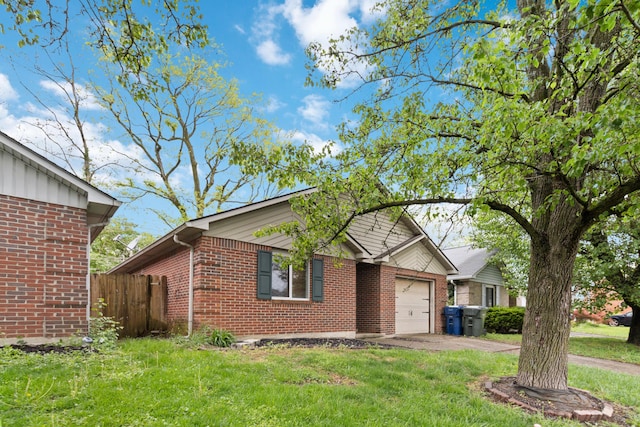 view of front of home with a front lawn, a garage, driveway, brick siding, and fence