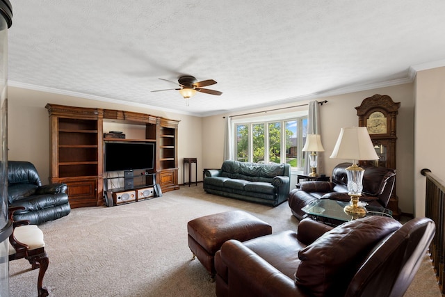 carpeted living area with crown molding, ceiling fan, and a textured ceiling