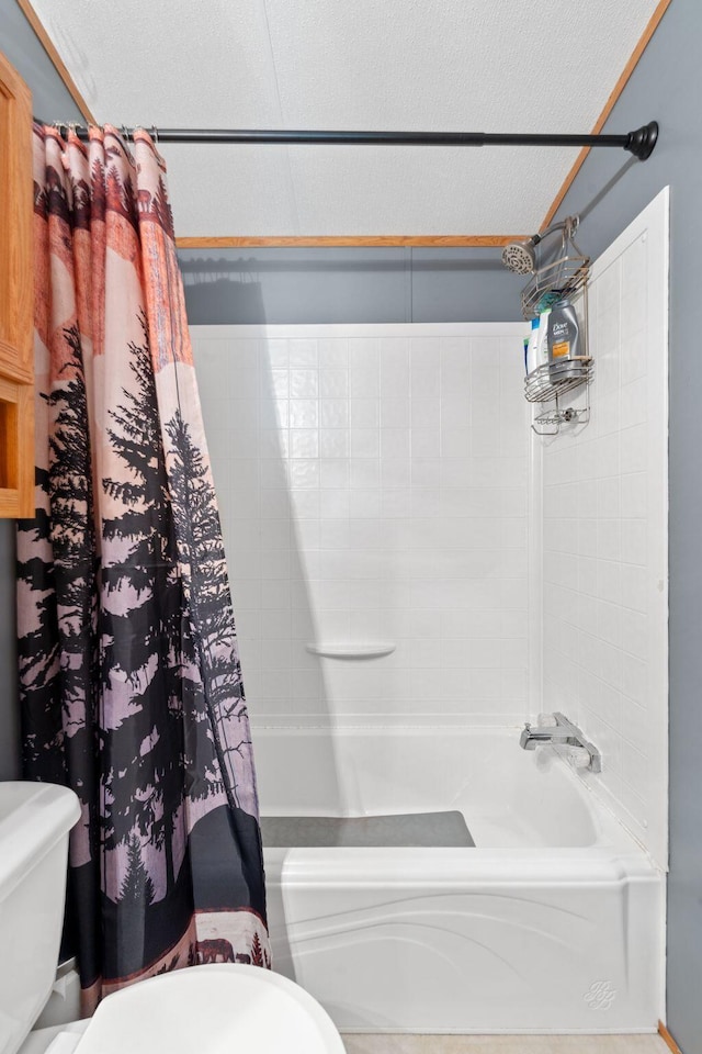 full bath with shower / tub combo and toilet