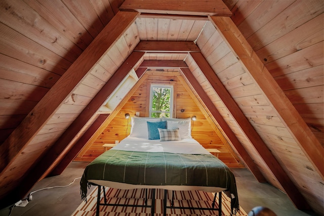bedroom with wooden walls, vaulted ceiling, and wood ceiling