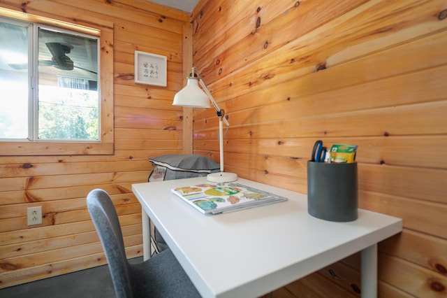 office featuring wood walls