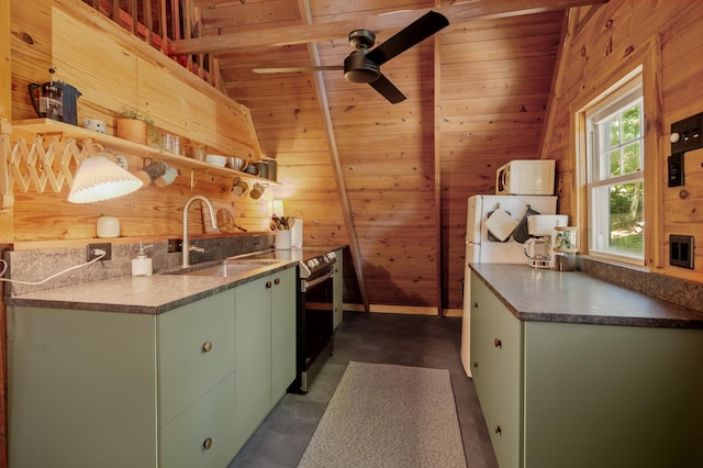 kitchen featuring a sink, concrete flooring, open shelves, wooden walls, and green cabinetry