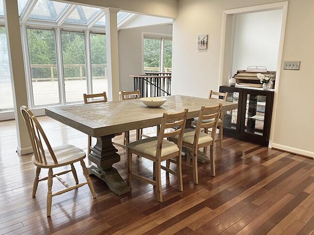 3426 Pepperhill Rd, Lexington, KY 40502 - dining area with dark wood-style flooring and baseboards